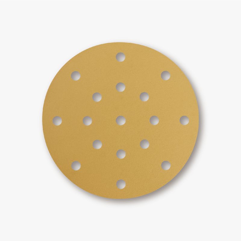 Goldene Schleifseite einer Sandwox 58 Gold Klettscheibe mit 15 Absauglöchern